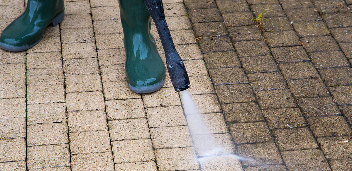 Outdoor floor cleaning with high pressure water jet